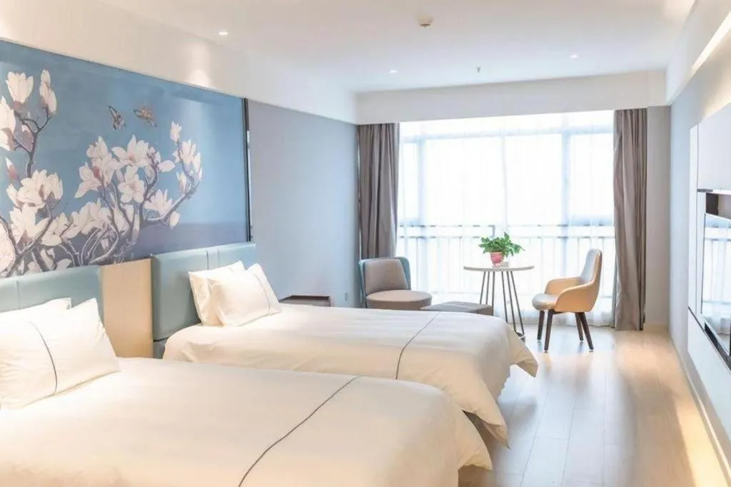 Bed in Magnotel Hotel Anshun West High-Speed Railway Station