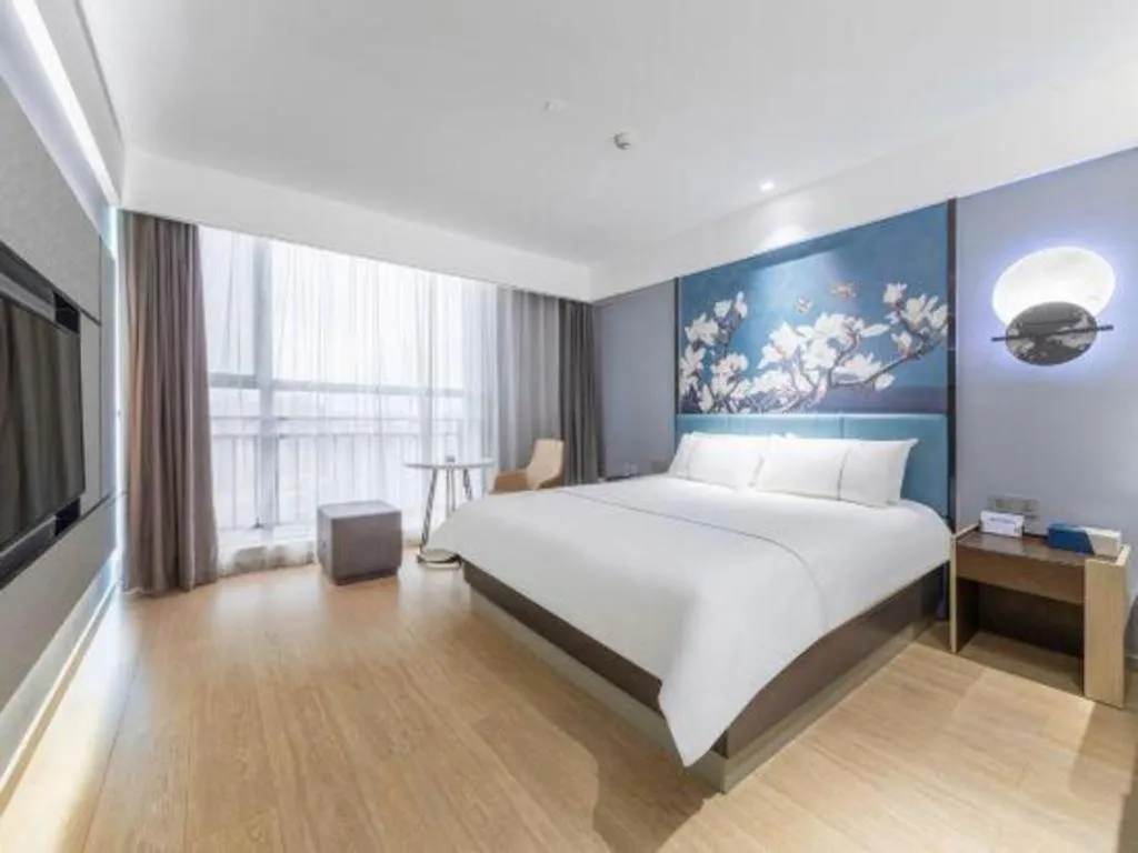 Bed in Magnotel Hotel Anshun West High-Speed Railway Station