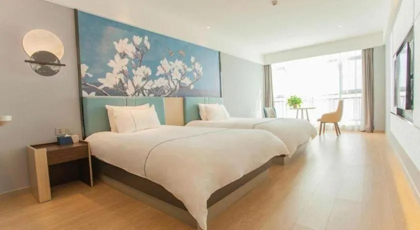 Bed in Magnotel Hotel Anshun West High-Speed Railway Station