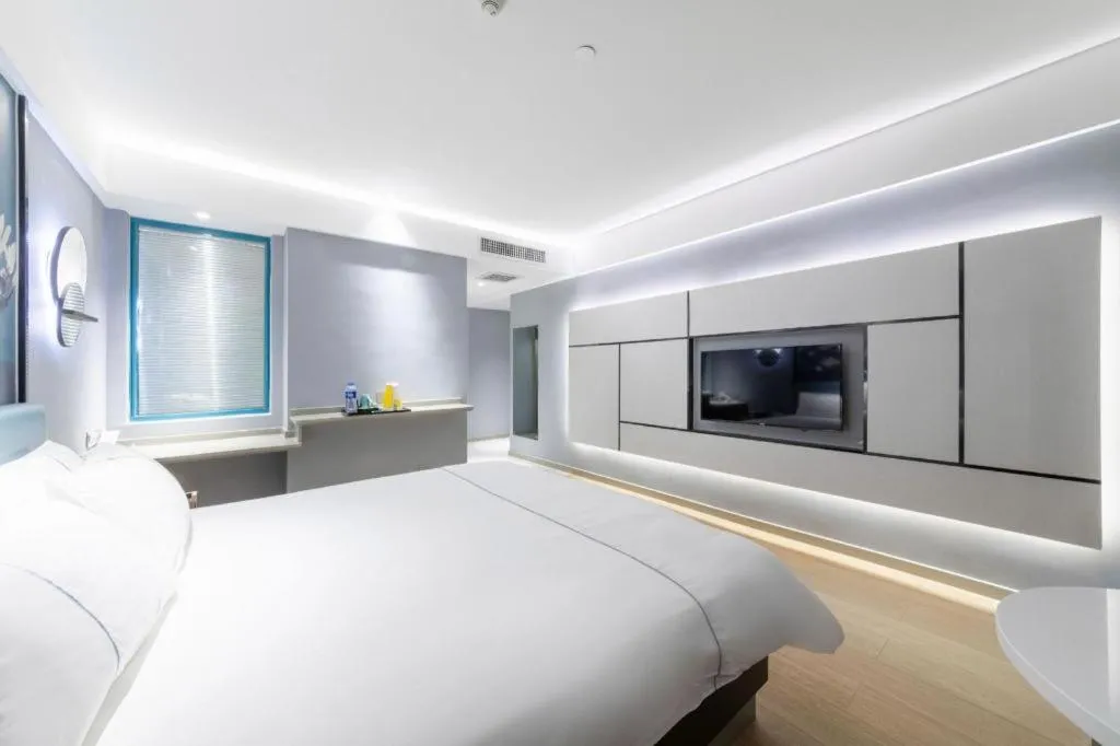 Bed in Magnotel Hotel Anshun West High-Speed Railway Station