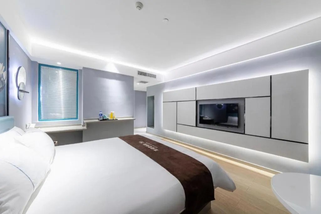 Bed in Magnotel Hotel Anshun West High-Speed Railway Station