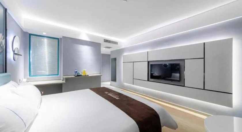 Bed in Magnotel Hotel Anshun West High-Speed Railway Station