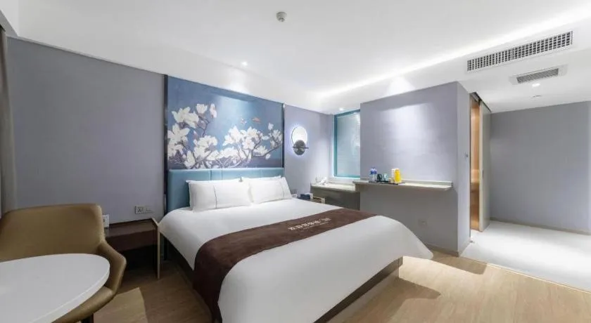 Bed in Magnotel Hotel Anshun West High-Speed Railway Station