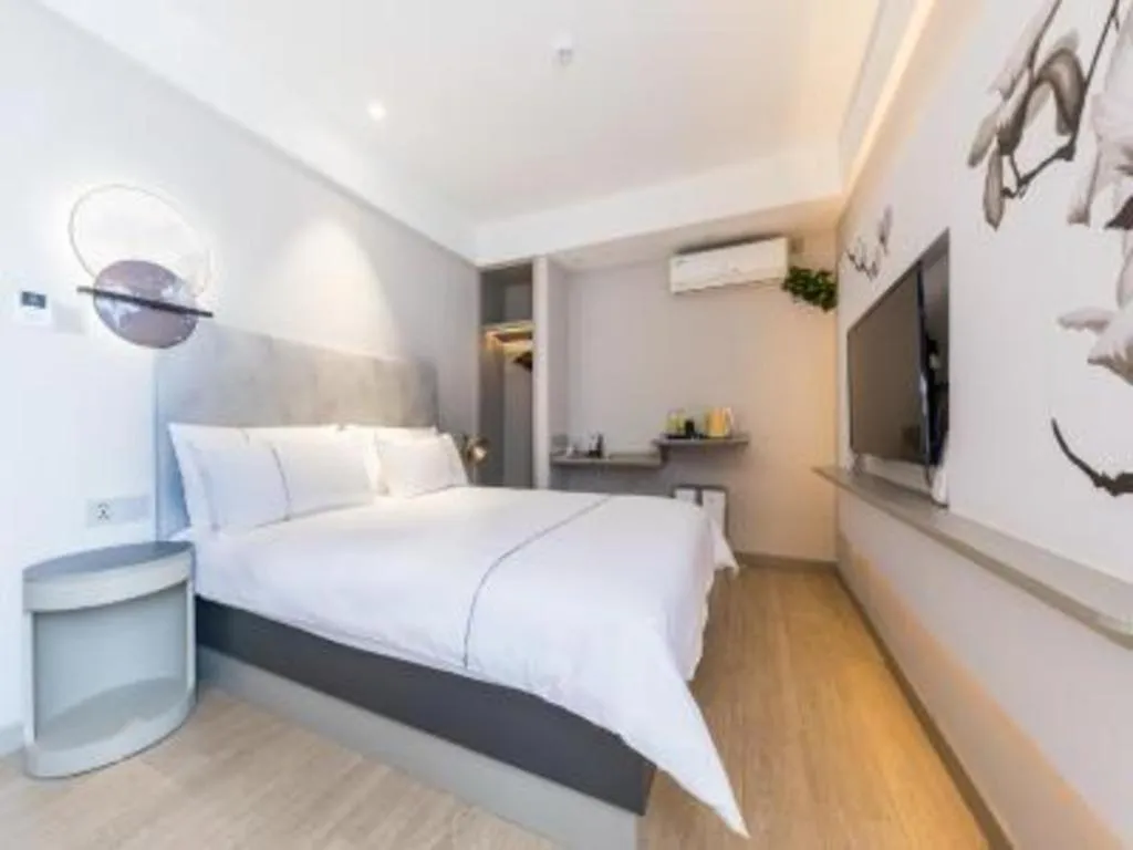 Bed in Magnotel Hotel Suzhou Guanqian Street Pingjiang Road