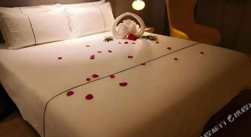 Bed in Magnotel Hotel Suzhou Guanqian Street Pingjiang Road