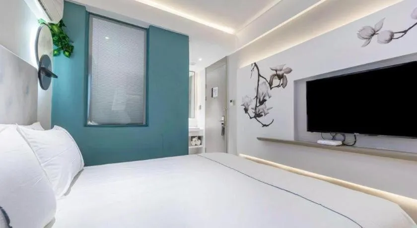 Bed in Magnotel Hotel Suzhou Guanqian Street Pingjiang Road