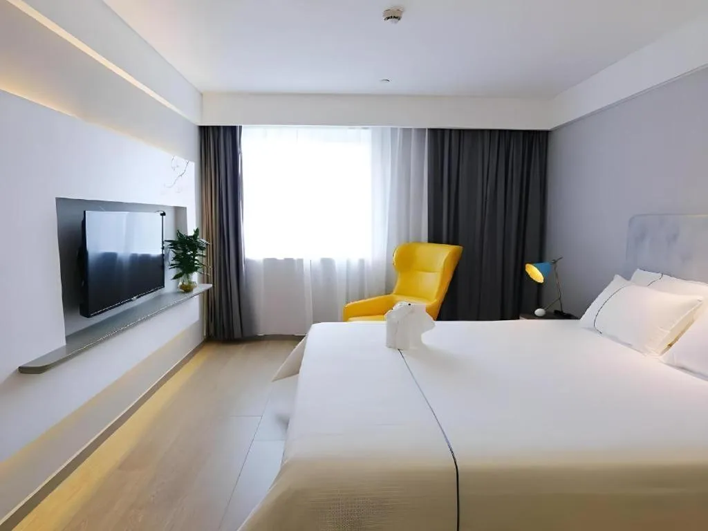 Bed in Magnotel Hotel Suzhou Guanqian Street Pingjiang Road