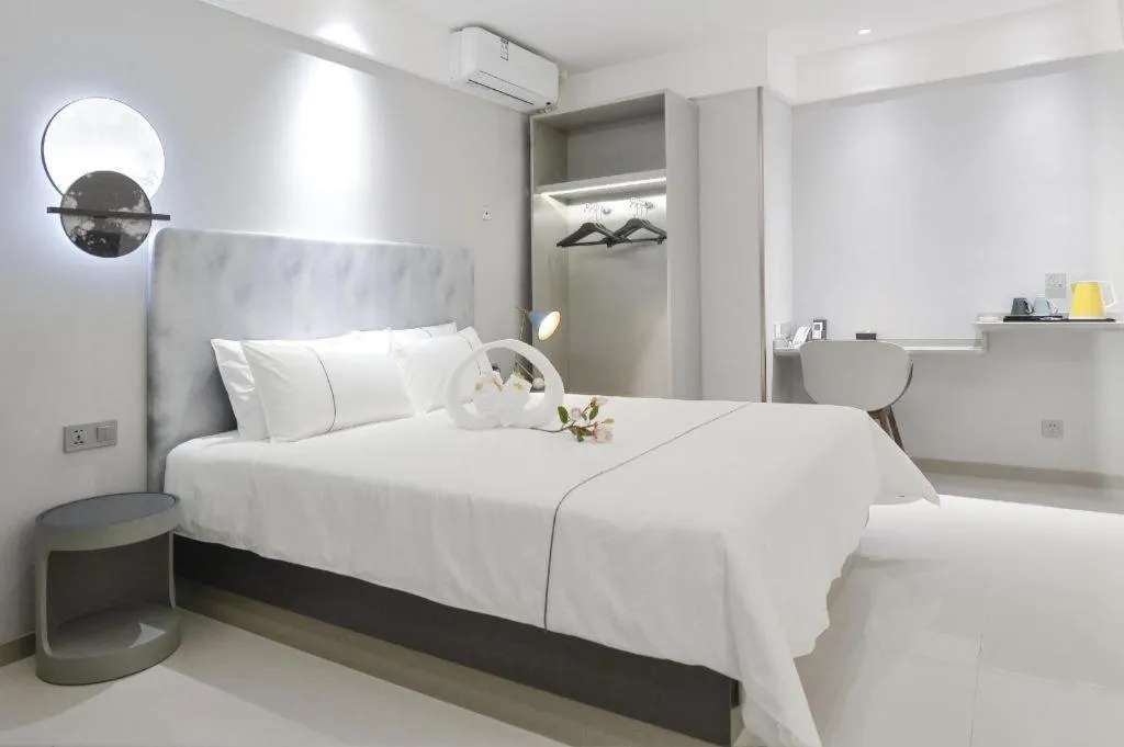 Bed in Magnotel Hotel Jining Yanzhou Metro Station Jiuxianqiao South Road