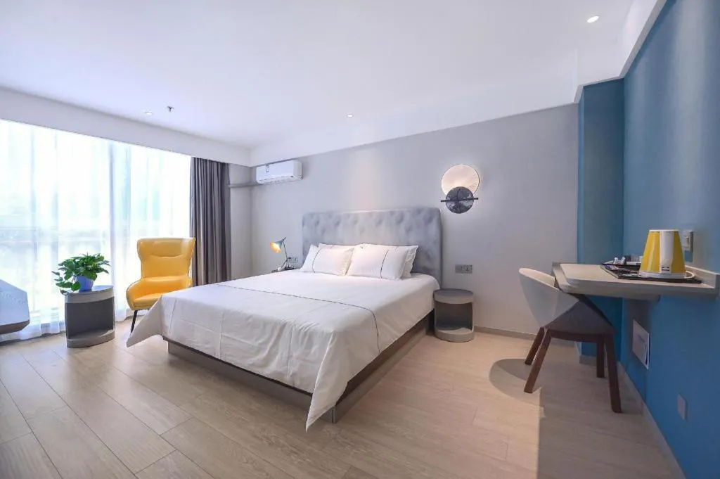 Bed in Magnotel Hotel Jining Yanzhou Metro Station Jiuxianqiao South Road