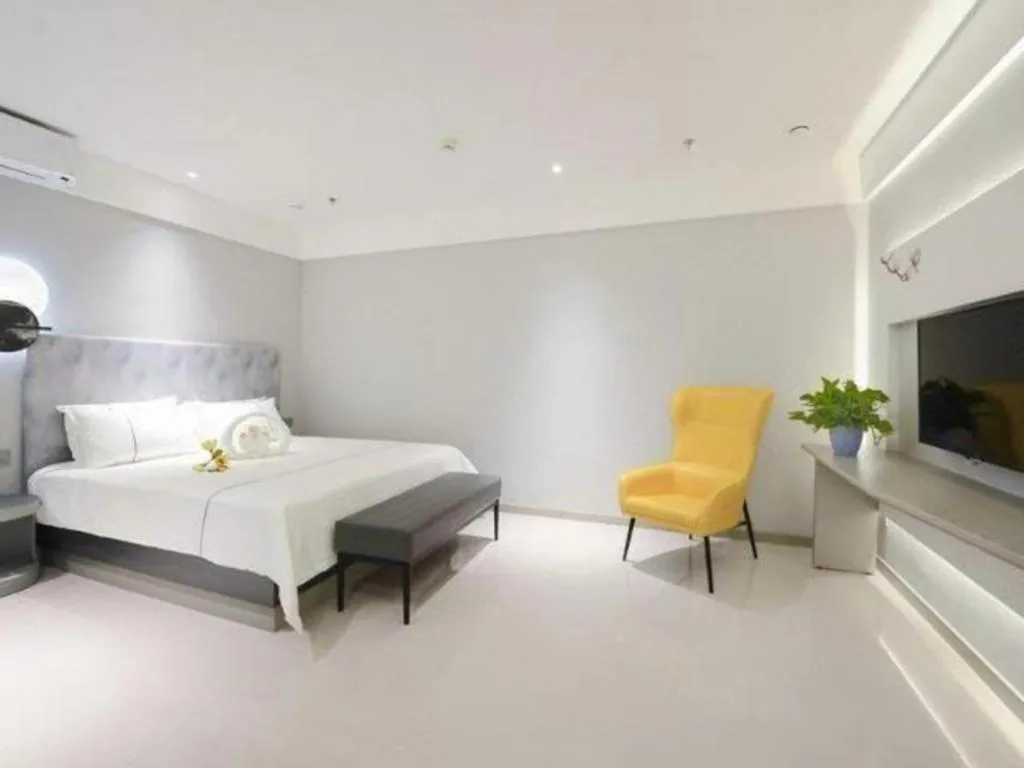 Bed in Magnotel Hotel Jining Yanzhou Metro Station Jiuxianqiao South Road