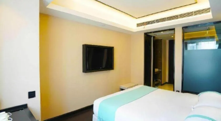 Bed in Xana Hotelle Zhengzhou North Passenger Terminal North University Town