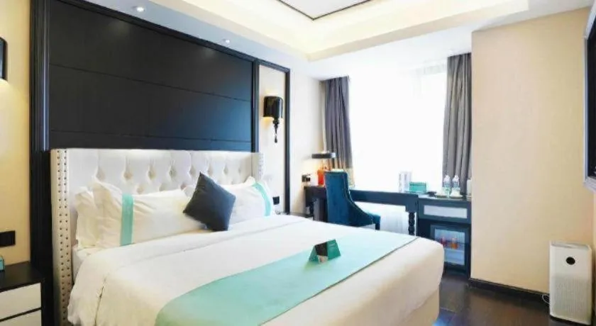 Bed in Xana Hotelle Zhengzhou North Passenger Terminal North University Town