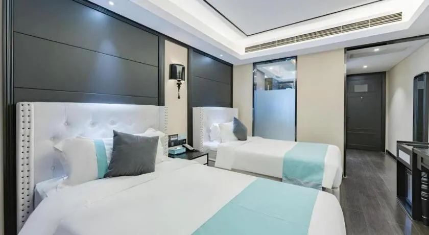 Bed in Xana Hotelle Zhengzhou North Passenger Terminal North University Town