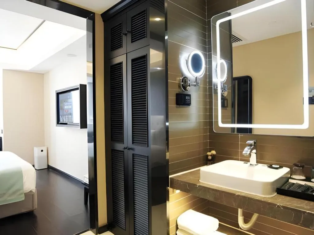 Bed in Xana Hotelle Zhengzhou North Passenger Terminal North University Town