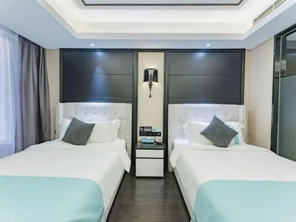 Bed in Xana Hotelle Zhengzhou North Passenger Terminal North University Town