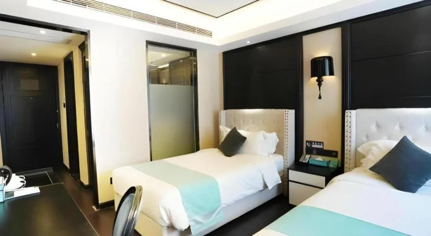 Bed in Xana Hotelle Zhengzhou North Passenger Terminal North University Town