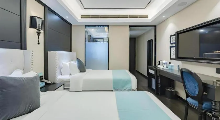 Bed in Xana Hotelle Zhengzhou North Passenger Terminal North University Town