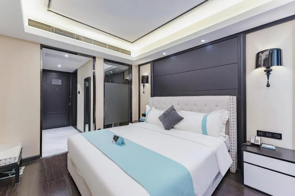 Bed in Xana Hotelle Zhengzhou North Passenger Terminal North University Town