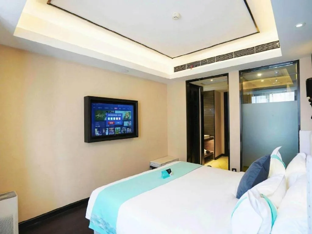 Bed in Xana Hotelle Zhengzhou North Passenger Terminal North University Town