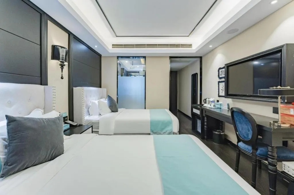 Bed in Xana Hotelle Zhengzhou North Passenger Terminal North University Town