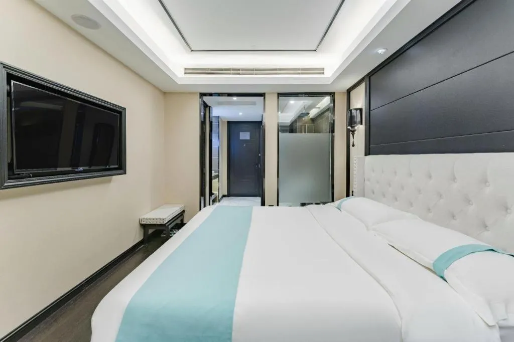 Bed in Xana Hotelle Zhengzhou North Passenger Terminal North University Town