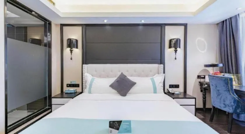 Bed in Xana Hotelle Zhengzhou North Passenger Terminal North University Town