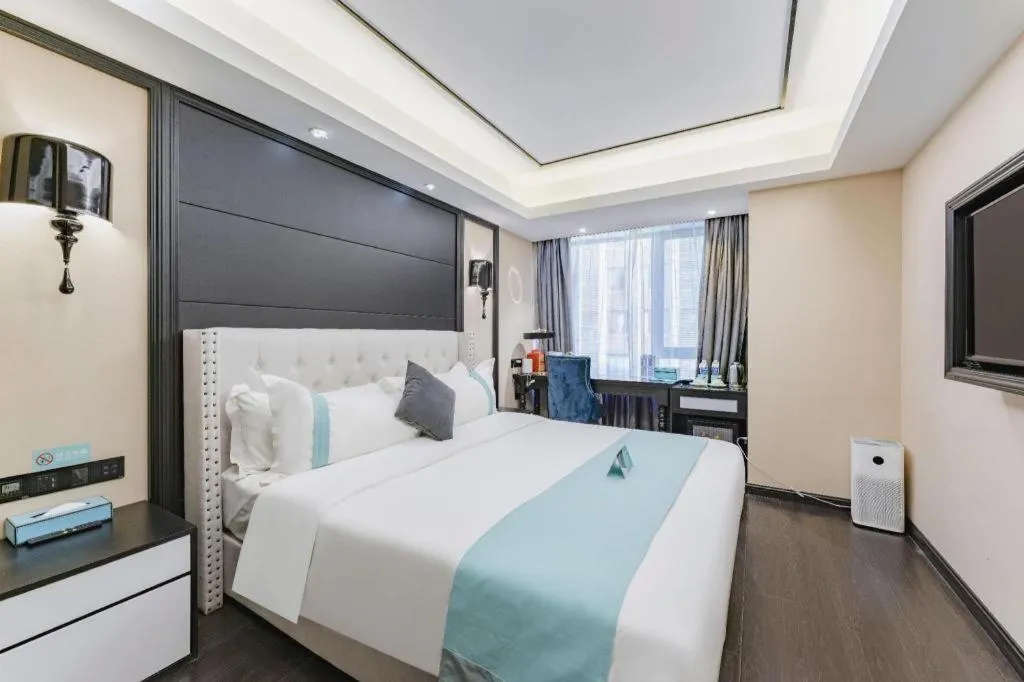 Bed in Xana Hotelle Zhengzhou North Passenger Terminal North University Town