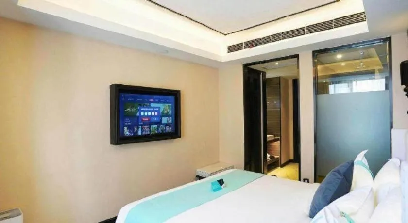 Bed in Xana Hotelle Zhengzhou North Passenger Terminal North University Town