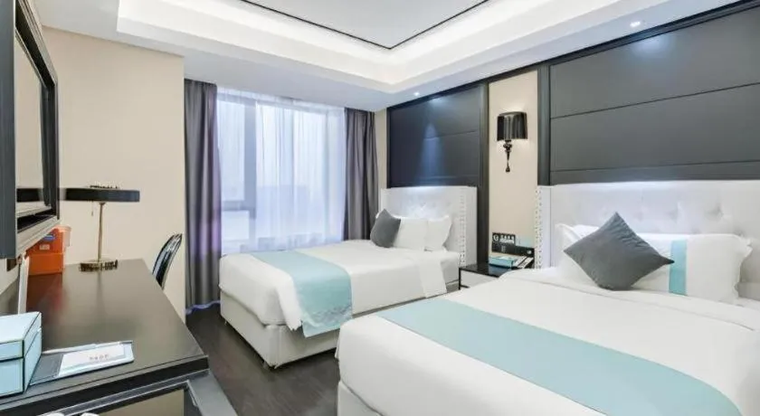 Bed in Xana Hotelle Zhengzhou North Passenger Terminal North University Town