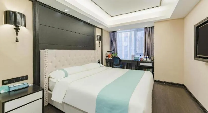 Bed in Xana Hotelle Zhengzhou North Passenger Terminal North University Town