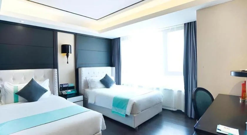 Bed in Xana Hotelle Zhengzhou North Passenger Terminal North University Town