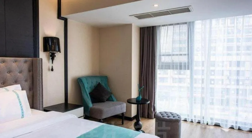 Bed in Xana Hotelle Chengdou Xindu Sanhechang Metro Station