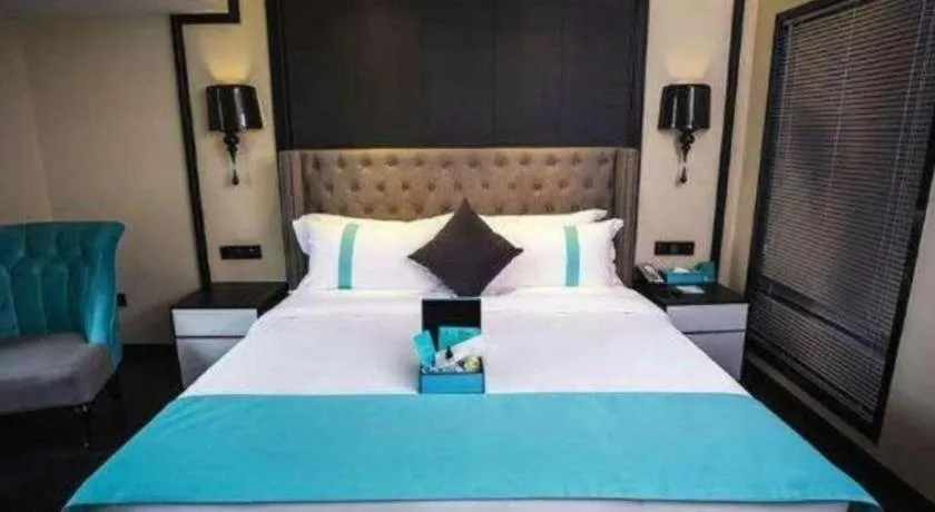 Bed in Xana Hotelle Chengdou Xindu Sanhechang Metro Station