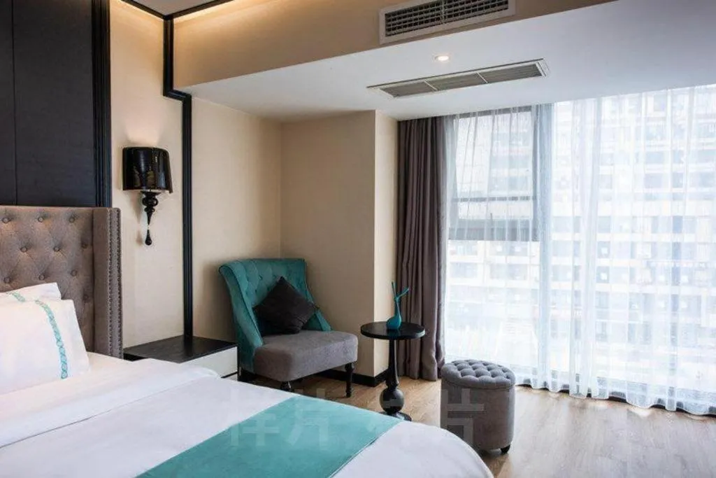 Bed in Xana Hotelle Chengdou Xindu Sanhechang Metro Station