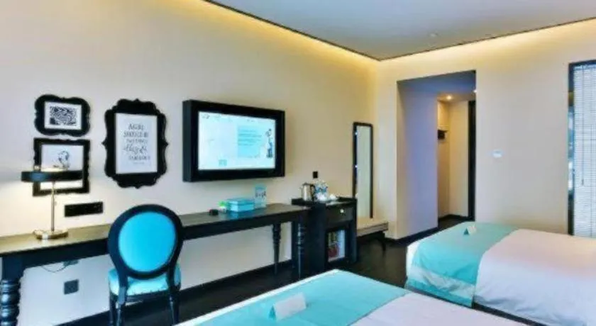 Bed in Xana Hotelle Chengdou Xindu Sanhechang Metro Station