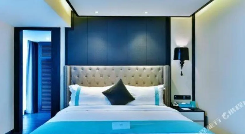 Bed in Xana Hotelle Chengdou Xindu Sanhechang Metro Station