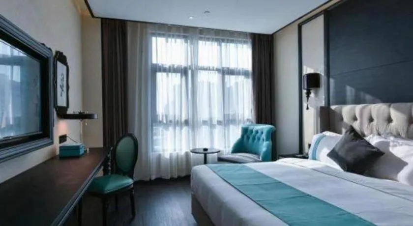 Bed in Xana Hotelle Chengdou Xindu Sanhechang Metro Station