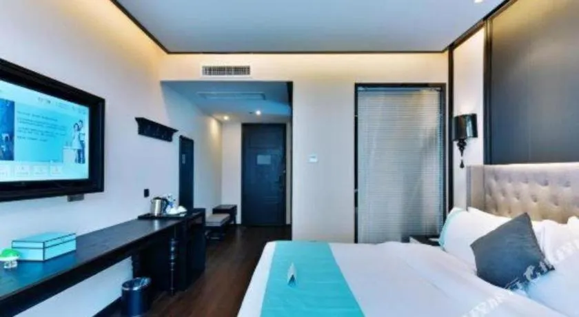 Bed in Xana Hotelle Chengdou Xindu Sanhechang Metro Station