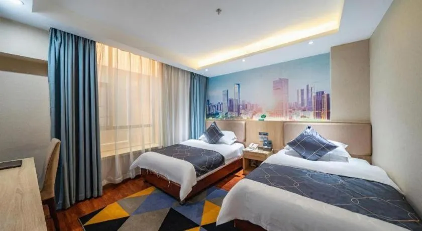 Bed in Chonpines Hotel Shenzhen Gongming Honghuashan Metro Station