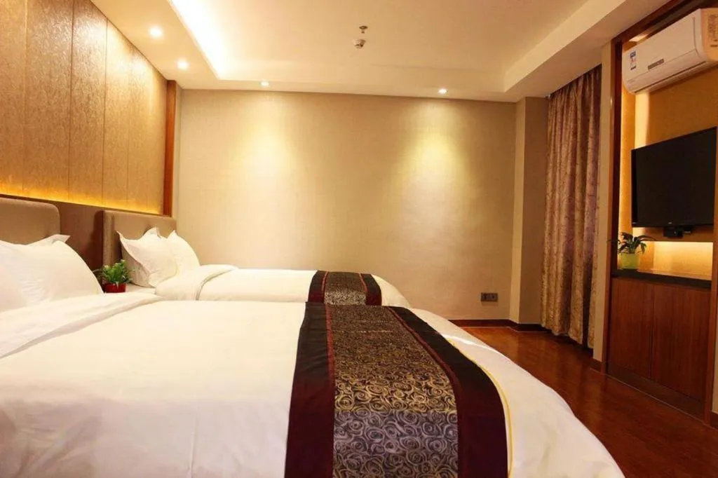 Bed in Chonpines Hotel Shenzhen Gongming Honghuashan Metro Station