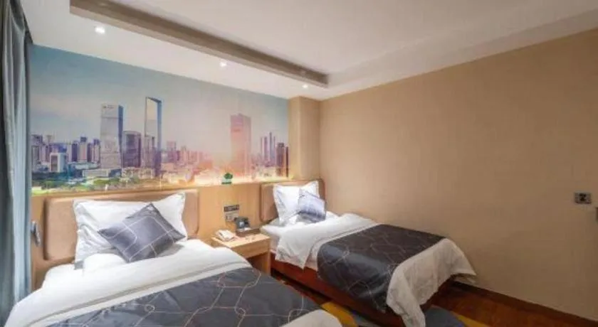 Bed in Chonpines Hotel Shenzhen Gongming Honghuashan Metro Station