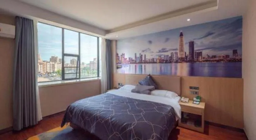 Bed in Chonpines Hotel Shenzhen Gongming Honghuashan Metro Station