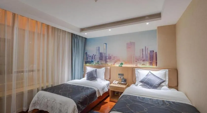 Bed in Chonpines Hotel Shenzhen Gongming Honghuashan Metro Station