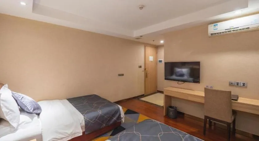 Bed in Chonpines Hotel Shenzhen Gongming Honghuashan Metro Station