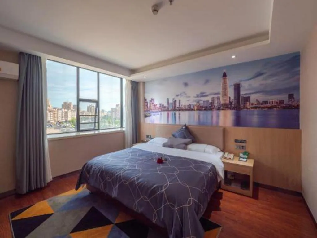 Bed in Chonpines Hotel Shenzhen Gongming Honghuashan Metro Station