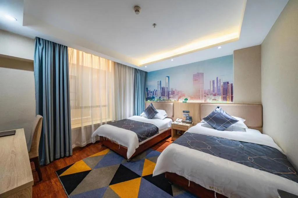 Bed in Chonpines Hotel Shenzhen Gongming Honghuashan Metro Station