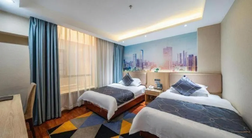 Bed in Chonpines Hotel Shenzhen Gongming Honghuashan Metro Station