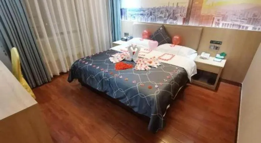Bed in Chonpines Hotel Shenzhen Gongming Honghuashan Metro Station