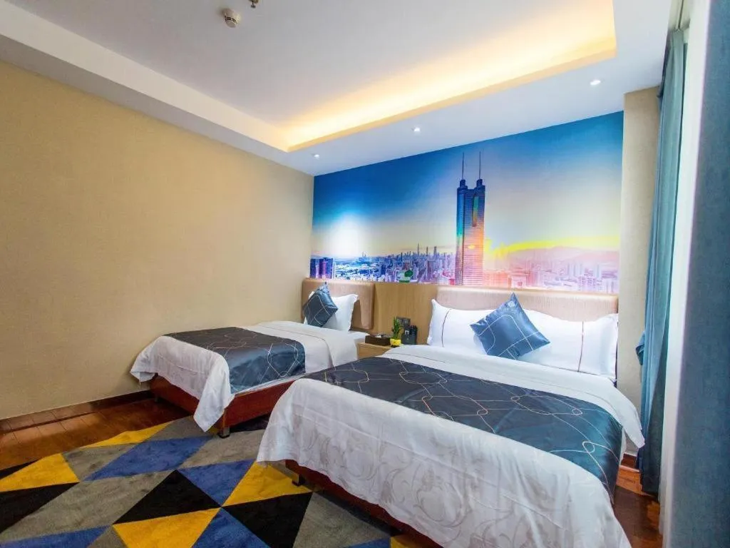 Bed in Chonpines Hotel Shenzhen Gongming Honghuashan Metro Station