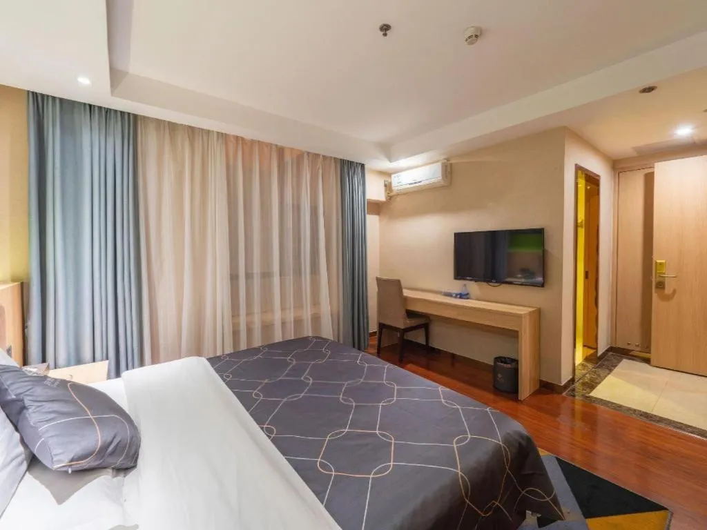 Bed in Chonpines Hotel Shenzhen Gongming Honghuashan Metro Station